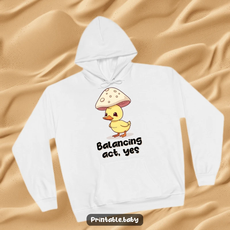 Funny duckling hoodie, comically balancing a large mushroom on its head, cozy and full of woodland humor.