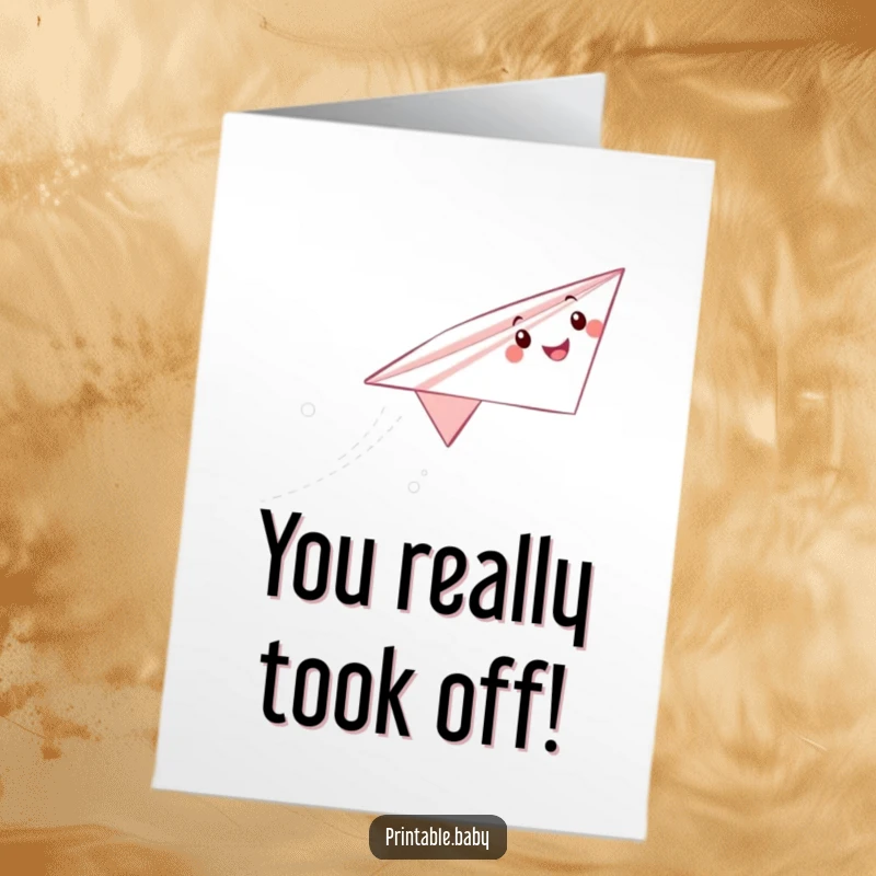 Funny Free Printable Congratulations Card showing a triumphant paper airplane character soaring through the sky.
