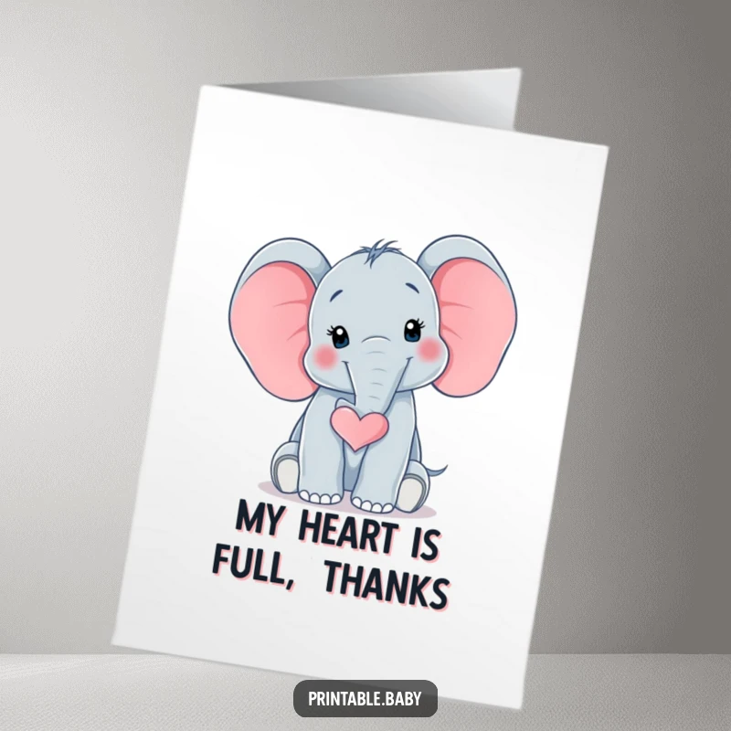 Funny Free Printable Thank You Card: Baby elephant’s trunk forms a perfect heart, showing sincere gratitude in a cute way.
