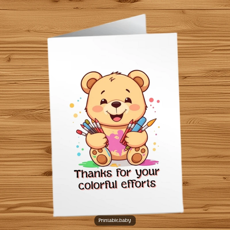 Funny Free Printable Thank You Card: Smiling teddy bear artistically splattered with paint, holding art supplies, expressing thanks.