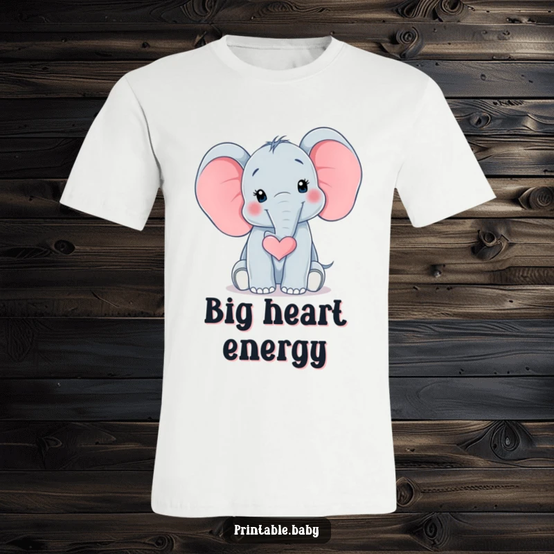 Funny Elephant Heart T-Shirt displaying a surprised baby elephant with its trunk curled into a heart shape, radiating adorable and gentle love.